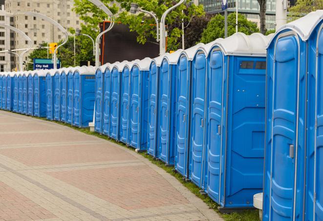 a row of portable restrooms at a fairground, offering visitors a clean and hassle-free experience in Big Bend